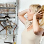 10769686 - the young woman is upset by that the gas water heater has broken